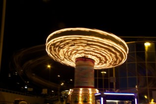 a long exposure of a fairground ride