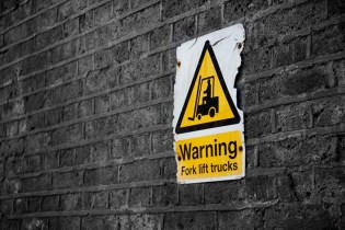 warning: forklifts image of a warning sign